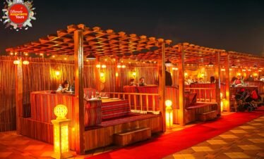 premium desert safari dubai camp interior majlis seating and soft lighting